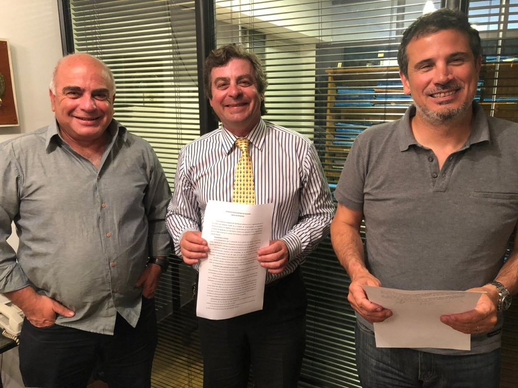 Convenio para el desarrollo de la Escuela de Vela Adaptada - P.Patiño - R.Castelli - Ferrari